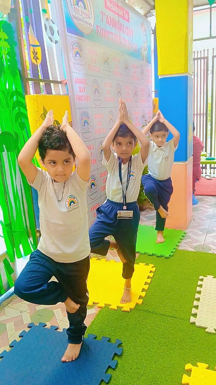 Children Practicing Yoga Tree Pose